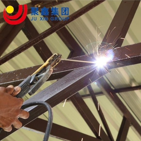 Q355 Q345 Metalowe ramy warsztaty prefabrykowane Metalowe budynki garażowe Śnieżne odporne na rdza